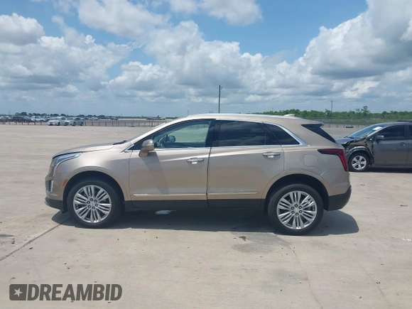2022 Cadillac XT5 AWD Premium Luxury with VIN 1GYKNDRSXNZ112680, listed as a IAAI auction lot 42389521 with 12,365 mi miles and . Bid and sale history available at DreamBid. Image 14.