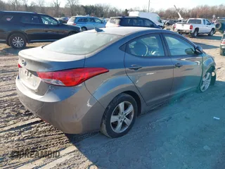2013 Hyundai Elantra GLS with VIN 5NPDH4AE5DH360708, listed as a IAAI auction lot 41458823 with 109,557 mi miles and . Bid and sale history available at DreamBid. Image 4.