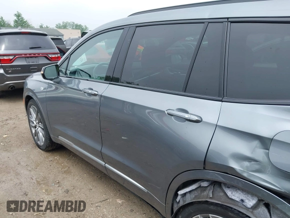 2021 Cadillac XT6 Sport with VIN 1GYKPGRS6MZ128112, listed as a IAAI auction lot 42415342 with 57,680 mi miles and . Bid and sale history available at DreamBid. Image 14.