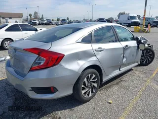 2016 Honda Civic Sedan EX with VIN 2HGFC2F74GH563268, listed as a IAAI auction lot 41805038 with 125,577 mi miles. Bid and sale history available at carsss.com. Image 4.