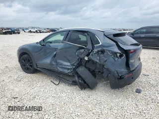 2023 Mazda CX-30 S Carbon Edition z VIN 3MVDMBCM2PM539130, wystawiony jako Copart lot #54817735 z przebiegiem 29 678 mil mil oraz Szkoda całkowita • Salvage title. Historia ofert i sprzedaży dostępna na DreamBid. Obrazek 2.
