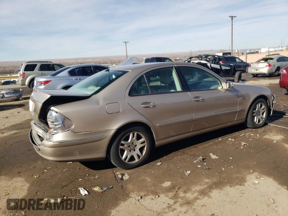 2003 Mercedes-Benz E 320 z VIN WDBUF65JX3A128263, wystawiony jako Copart lot #87302304 z przebiegiem 135 367 mil mil oraz Szkoda całkowita • Salvage title. Historia ofert i sprzedaży dostępna na DreamBid. Obrazek 3.