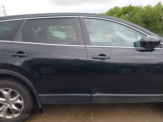 2015 Mazda CX-9 Sport with VIN JM3TB3BV1F0466070, listed as a IAAI auction lot 42350686 with 110,818 mi miles and . Bid and sale history available at DreamBid. Image 14.