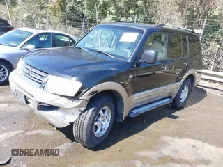 2002 Mitsubishi Montero XLS z VIN JA4MW31R52J070132, wystawiony jako IAAI lot #41782522 z przebiegiem 92 575 mil mil oraz . Historia ofert i sprzedaży dostępna na DreamBid. Obrazek 18.