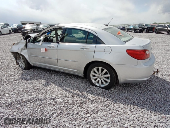 2010 Chrysler Sebring Limited with VIN 1C3CC5FDXAN162044, listed as a Copart auction lot 56789075 with Not provided miles and Non repairable. Bid and sale history available at DreamBid. Image 2.