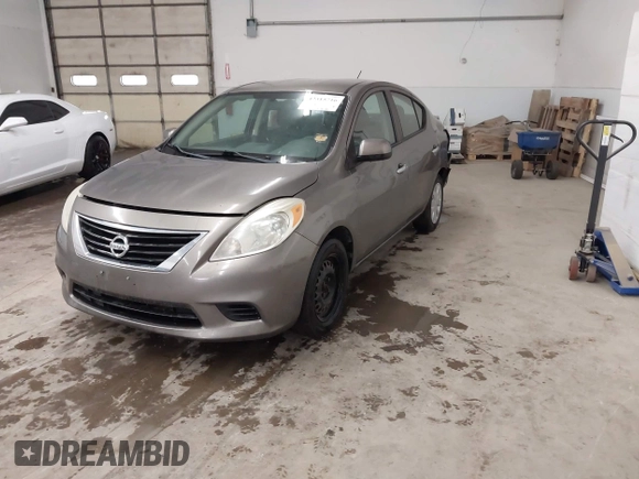 2013 Nissan Versa SV with VIN 3N1CN7AP2DL867060, listed as a IAAI auction lot 42315716 with 159,969 mi miles and . Bid and sale history available at DreamBid. Image 2.