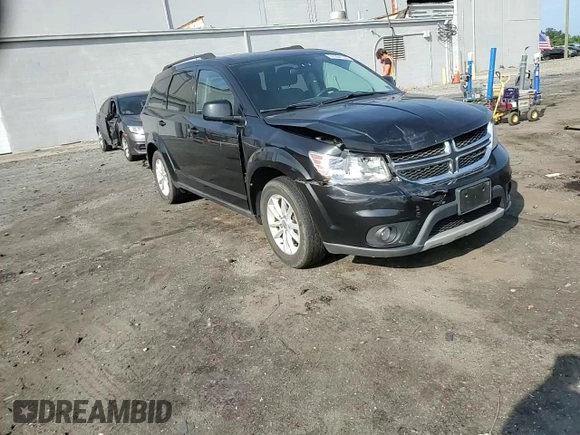 2013 Dodge Journey SXT with VIN 3C4PDCBG4DT619319, listed as a Copart auction lot 62964135 with 140,620 mi miles and Salvage title. Bid and sale history available at DreamBid. Image 14.