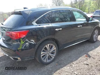 2018 Acura MDX Technology with VIN 5J8YD4H59JL005102, listed as a IAAI auction lot 42155562 with 71,890 mi miles and . Bid and sale history available at DreamBid. Image 4.