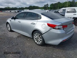 2018 Kia Optima EX with VIN 5XXGU4L34JG237557, listed as a IAAI auction lot 42000008 with 128,694 mi miles and . Bid and sale history available at carsss.com. Image 3.
