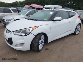 2016 Hyundai Veloster with VIN KMHTC6ADXGU273034, listed as a IAAI auction lot 40420771 with 206,694 mi miles. Bid and sale history available at carsss.com. Image 2.