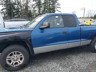 2001 Dodge Dakota Sport with VIN 1B7GL22N61S345811, listed as a IAAI auction lot 41676836 with 189,484 mi miles. Bid and sale history available at carsss.com. Image 14.