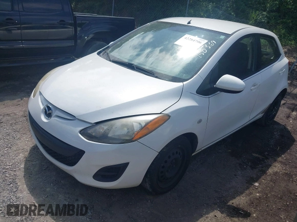 2012 Mazda 2 Sport with VIN JM1DE1KY6C0150369, listed as a IAAI auction lot 42284706 with 205,845 mi miles and . Bid and sale history available at DreamBid. Image 2.