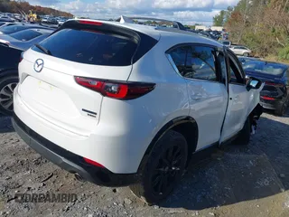 2024 Mazda CX-5 2.5 Carbon Turbo with VIN JM3KFBAY3R0529583, listed as a IAAI auction lot 40916105 with 5,037 mi miles. Bid and sale history available at carsss.com. Image 4.