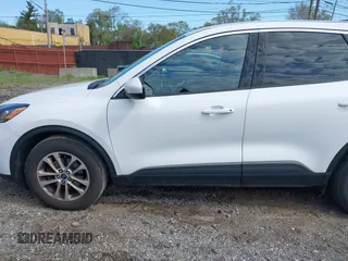 2021 Ford Escape SE z VIN 1FMCU0G60MUB22668, wystawiony jako IAAI lot #42213083 z przebiegiem 25 159 mil mil oraz . Historia ofert i sprzedaży dostępna na DreamBid. Obrazek 14.