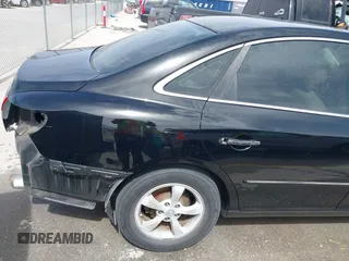 2006 Hyundai Azera SE with VIN KMHFC46F06A113482, listed as a IAAI auction lot 41733834 with 242,159 mi miles and . Bid and sale history available at DreamBid. Image 12.