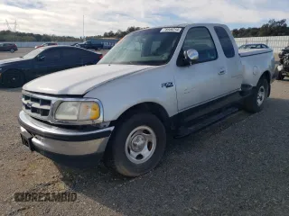2001 Ford F-150 XL with VIN 1FTZX07261KF67717, listed as a Copart auction lot 78946214 with Not provided miles and Salvage title. Bid and sale history available at DreamBid. Image 1.