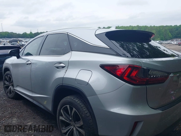 2018 Lexus RX 350 z VIN 2T2ZZMCA4JC100212, wystawiony jako IAAI lot #42197456 z przebiegiem 63 078 mil mil oraz . Historia ofert i sprzedaży dostępna na DreamBid. Obrazek 13.