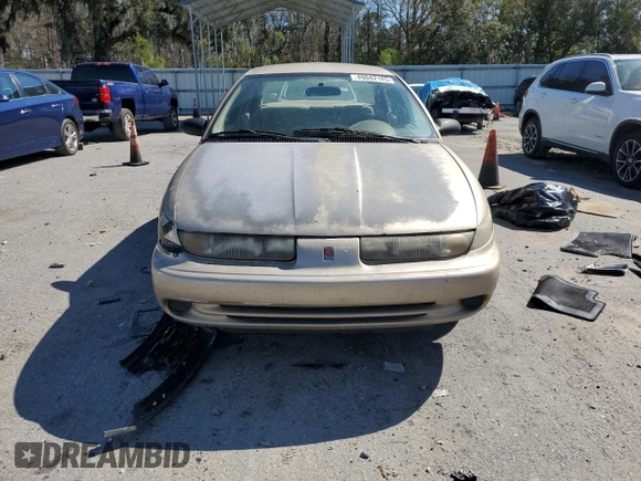 1999 Saturn SL с VIN 1G8ZK527XXZ111390, выставлен на аукционе Copart как лот 49042185 с пробегом 164 733 миль миль и Списание • Salvage title. История ставок и продаж доступна на DreamBid. Изображение 5.
