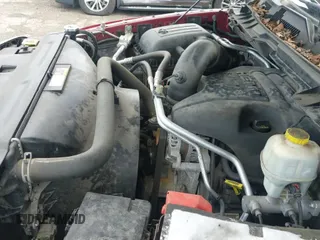 2014 Ram 1500 Big Horn z VIN 1C6RR7LT1ES231813, wystawiony jako IAAI lot #43165556 z przebiegiem 112 974 mil mil oraz . Historia ofert i sprzedaży dostępna na DreamBid. Obrazek 22.