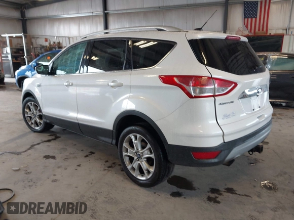 2016 Ford Escape Titanium with VIN 1FMCU9J90GUA18743, listed as a IAAI auction lot 42419730 with 102,666 mi miles and . Bid and sale history available at DreamBid. Image 3.