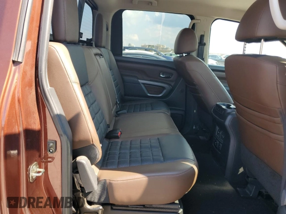 2018 Nissan Titan Pro-4X z VIN 1N6AA1E50JN526481, wystawiony jako Copart lot #71800504 z przebiegiem 147 463 mil mil oraz Szkoda całkowita • Salvage title. Historia ofert i sprzedaży dostępna na DreamBid. Obrazek 11.
