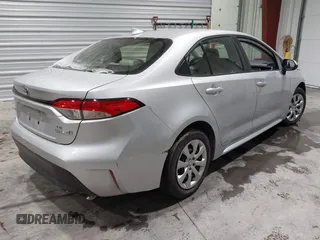 2023 Toyota Corolla Hybrid LE with VIN JTDBDMHE6P3003191, listed as a IAAI auction lot 41562160 with 86,206 mi miles. Bid and sale history available at carsss.com. Image 4.