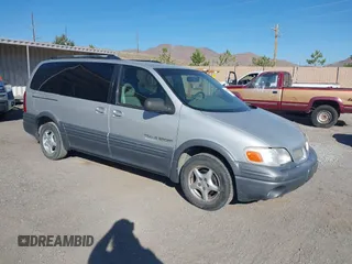1998 Pontiac Montana z VIN 1GMDX03E3WD175649, wystawiony jako IAAI lot #42487303 z przebiegiem 169 680 mil mil oraz . Historia ofert i sprzedaży dostępna na DreamBid. Obrazek 1.