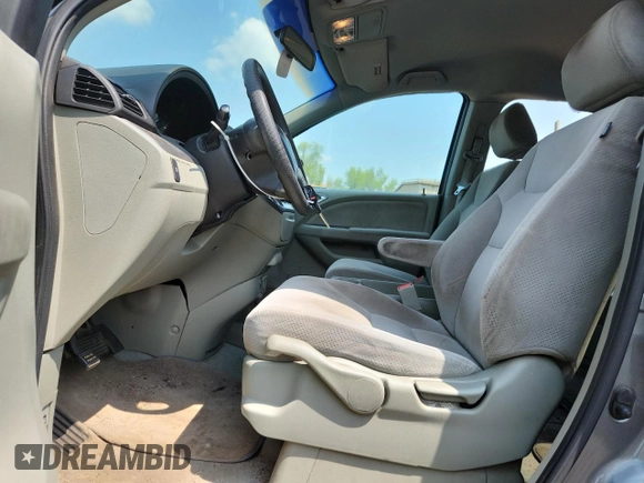 2007 Honda Odyssey LX z VIN 5FNRL38257B011710, wystawiony jako Copart lot #61163265 z przebiegiem 196 575 mil mil oraz Czysty tytuł • Clean title. Historia ofert i sprzedaży dostępna na DreamBid. Obrazek 7.