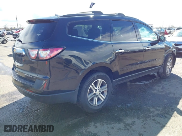 2015 Chevrolet Traverse LT with VIN 1GNKVGKD5FJ276168, listed as a IAAI auction lot 41803936 with 103,447 mi miles and . Bid and sale history available at DreamBid. Image 4.