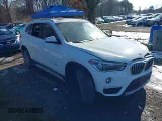 2017 BMW X1 xDrive28i with VIN WBXHT3Z36H4A52364, listed as a IAAI auction lot 41397667 with 61,960 mi miles. Bid and sale history available at carsss.com. Image 1.