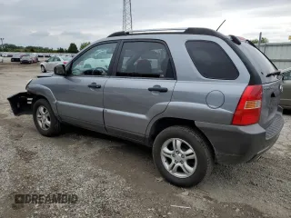 2005 Kia Sportage LX with VIN KNDJF723057062113, listed as a Copart auction lot 66630164 with 129,715 mi miles and Salvage Title. Bid and sale history available at carsss.com. Image 2.