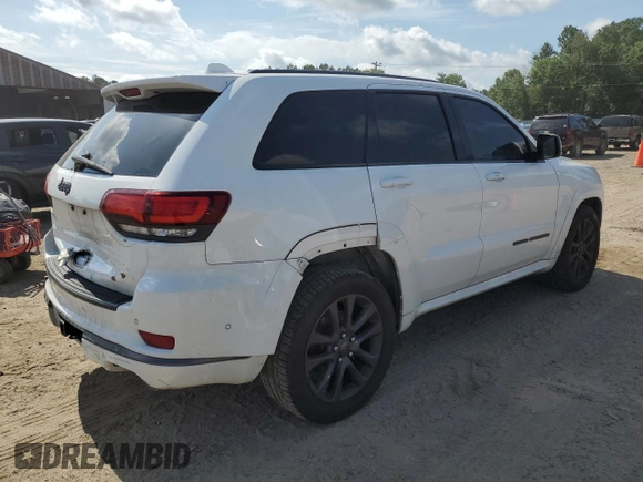 2018 Jeep Grand Cherokee High Altitude with VIN 1C4RJECG1JC260482, listed as a Copart auction lot 57310115 with 144,320 mi miles and Salvage title. Bid and sale history available at DreamBid. Image 3.