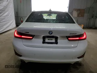 2022 BMW 3 Series 330i xDrive with VIN 3MW5R7J01N8C78063, listed as a Copart auction lot 55321055 with 22,797 mi miles and Salvage title. Bid and sale history available at DreamBid. Image 6.