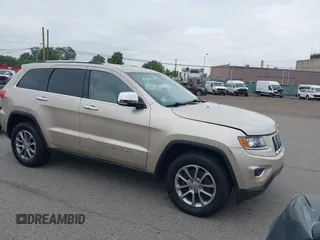 2014 Jeep Grand Cherokee Limited with VIN 1C4RJFBG8EC408754, listed as a IAAI auction lot 42612211 with 149,017 mi miles and . Bid and sale history available at DreamBid. Image 1.