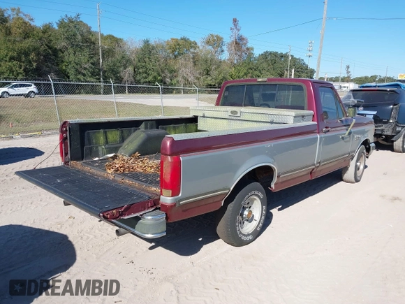 1991 Ford F-150 with VIN 2FTDF15N4MCB09103, listed as a IAAI auction lot 41015303 with 30,932 mi miles. Bid and sale history available at carsss.com. Image 4.