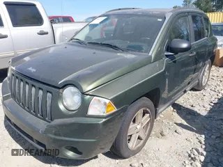 2008 Jeep Compass Sport with VIN 1J8FF47WX8D758998, listed as a IAAI auction lot 42061944 with 271,977 mi miles and . Bid and sale history available at carsss.com. Image 2.