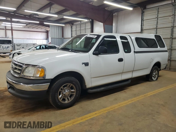 2001 Ford F-150 XL with VIN 1FTRX17L51NB25752, listed as a Copart auction lot 48721235 with 179,941 mi miles and Salvage title. Bid and sale history available at DreamBid. Image 1.