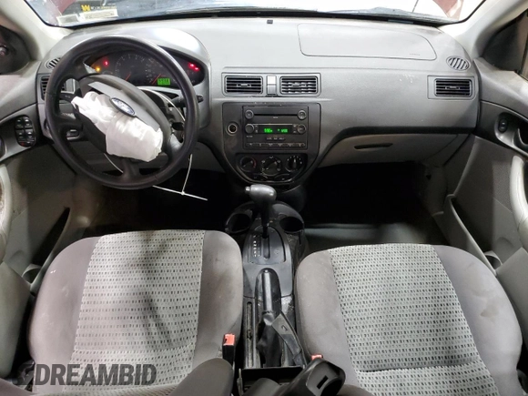 2006 Ford Focus S z VIN 1FAFP34N76W153239, wystawiony jako Copart lot #53085555 z przebiegiem 118 259 mil mil oraz Szkody całkowita. Historia ofert i sprzedaży dostępna na DreamBid. Obrazek 8.