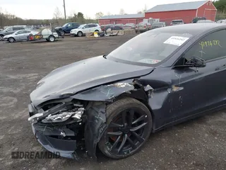 2021 Tesla Model S Long Range with VIN 5YJSA1E5XMF428519, listed as a IAAI auction lot 41926242 with 54,284 mi miles and . Bid and sale history available at DreamBid. Image 6.