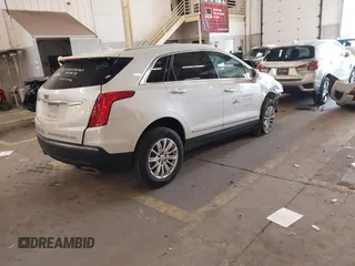 2017 Cadillac XT5 FWD with VIN 1GYKNARS7HZ121596, listed as a IAAI auction lot 41825879 with 82,023 mi miles and . Bid and sale history available at DreamBid. Image 4.
