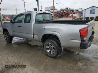 2018 Toyota Tacoma SR with VIN 5TFRX5GN1JX124112, listed as a Copart auction lot 50596975 with 57,587 mi miles and Salvage Title. Bid and sale history available at DreamBid. Image 2.