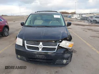 2008 Dodge Grand Caravan SXT with VIN 2D8HN54P48R827298, listed as a IAAI auction lot 41972302 with 199,903 mi miles and . Bid and sale history available at DreamBid. Image 6.