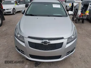 2014 Chevrolet Cruze 1LT with VIN 1G1PC5SB1E7229344, listed as a IAAI auction lot 42196094 with 97,226 mi miles and . Bid and sale history available at DreamBid. Image 6.