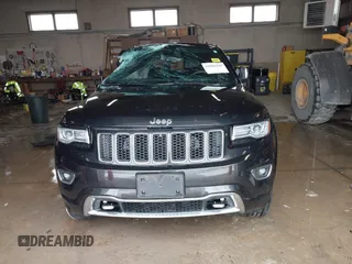 2014 Jeep Grand Cherokee Overland with VIN 1C4RJFCGXEC181159, listed as a IAAI auction lot 41861192 with 111,401 mi miles. Bid and sale history available at carsss.com. Image 12.