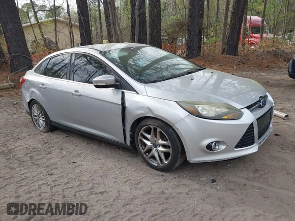 2014 Ford Focus Titanium with VIN 1FADP3J20EL148417, listed as a IAAI auction lot 41954291 with 120,098 mi miles. Bid and sale history available at carsss.com. Image 1.