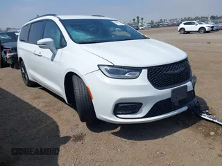 2021 Chrysler Pacifica Touring with VIN 2C4RC1FG7MR605587, listed as a IAAI auction lot 42329028 with 111,305 mi miles and . Bid and sale history available at DreamBid. Image 1.
