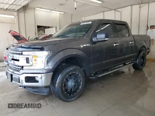 2018 Ford F-150 XL with VIN 1FTEW1E51JFD24037, listed as a Copart auction lot 59372655 with 98,465 mi miles and Salvage title. Bid and sale history available at DreamBid. Image 1.