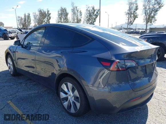 2022 Tesla Model Y Long Range with VIN 7SAYGAEEXNF381389, listed as a IAAI auction lot 41613075 with 52,800 mi miles and . Bid and sale history available at carsss.com. Image 3.