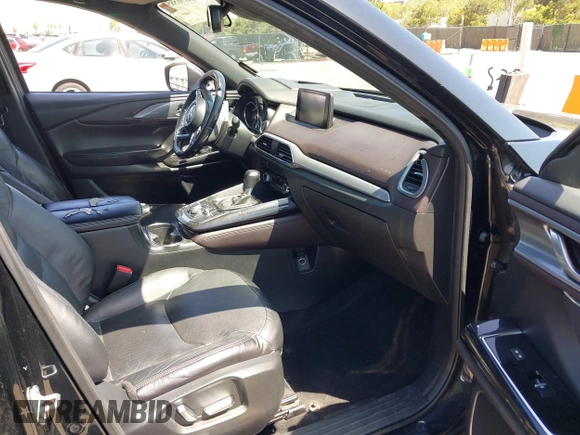 2016 Mazda CX-9 Grand Touring with VIN JM3TCBDY4G0113693, listed as a IAAI auction lot 41965857 with 152,403 mi miles and . Bid and sale history available at DreamBid. Image 5.