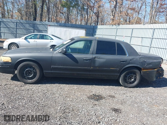 2011 Ford Crown Victoria with VIN 2FABP7AV9BX121739, listed as a IAAI auction lot 41763311 with 215,727 mi miles. Bid and sale history available at carsss.com. Image 14.